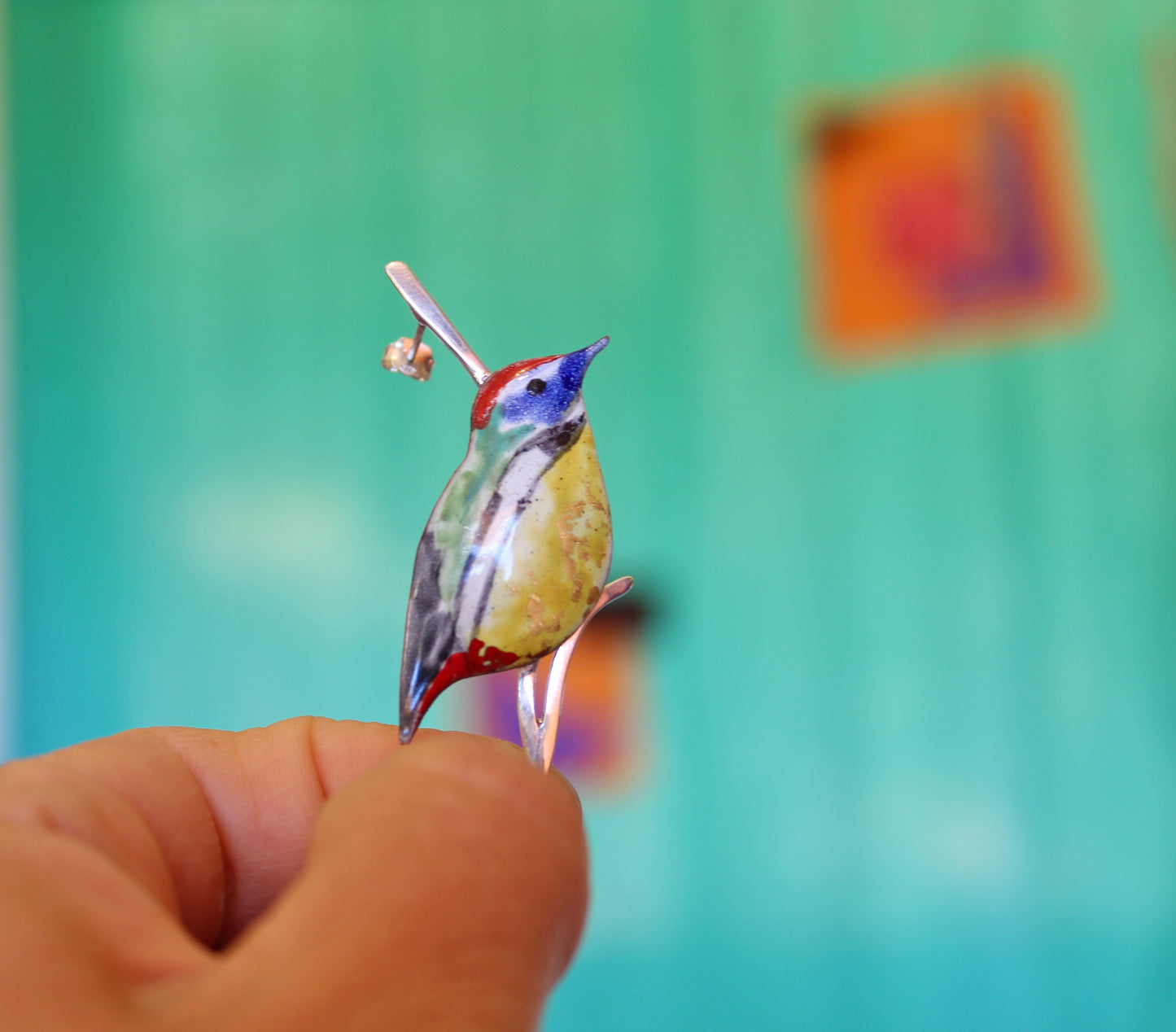 Aros siete colores sobre rama